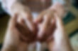 Young Hands Holding Old Hands