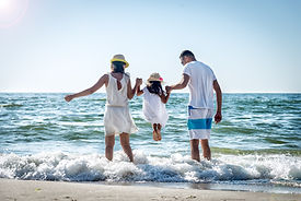 Família na praia