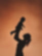 Mother Lifting Child Silhouette