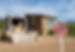 Sold sign and moving van outside house