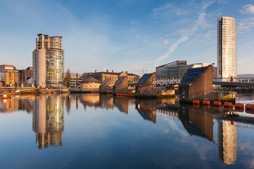 UK, Northern Ireland, Belfast, city skyline along River Lagan with the Lagan Weir Hydro en