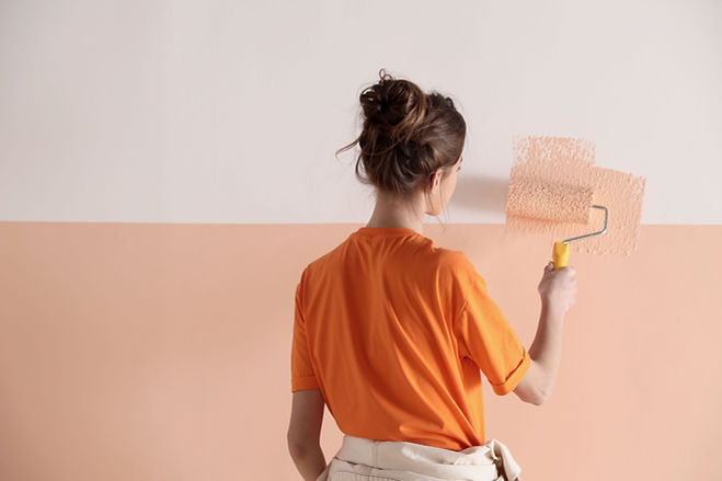 Woman Painting Wall