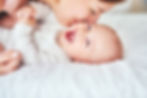 Mother and newborn baby bonding together, showcasing attachment and emotional connection in early infancy