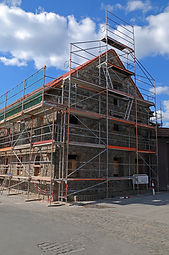 House renovation Construction site with a part of an old house being under renovation