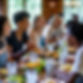 A group of people eating at a large table