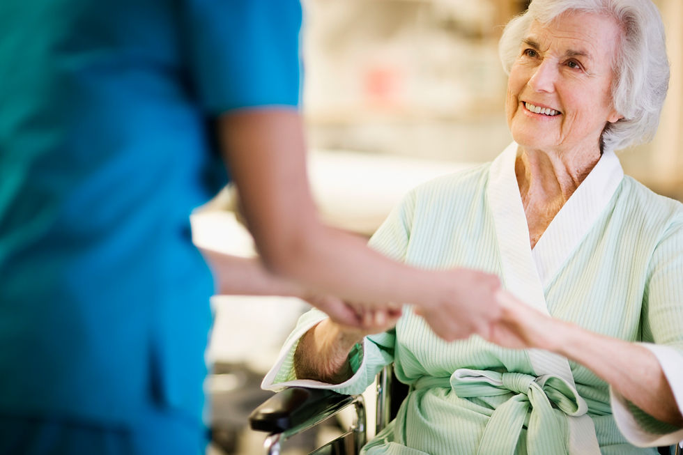 Nurse Holding Hands with Elderly Patient