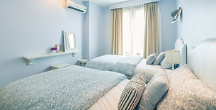 Bedroom with blue painted walls