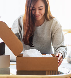 Woman Opening Package
