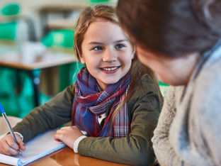 student with teacher