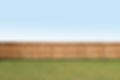 Fence at the end of a back yard,