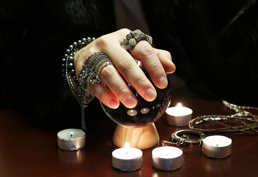 Crystal Ball in Psychic Hands