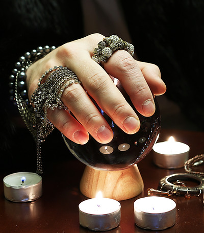 Crystal Ball in Psychic Hands