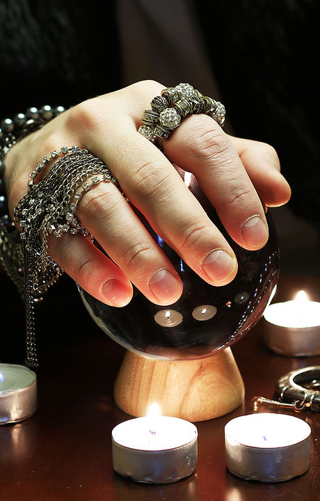 Crystal Ball in Psychic Hands