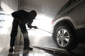 Man Cleaning Car
