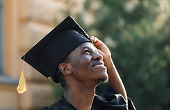 a graduate smiling listening to custom graduation songsa
