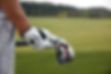 Holding Golf Clubs