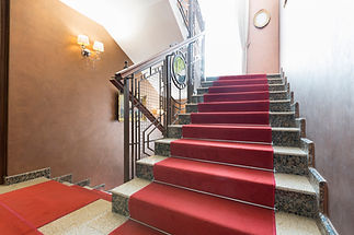 Red carpeted staircase interior