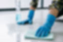 Husband housekeeping and cleaning concept, Happy young man in blue rubber gloves