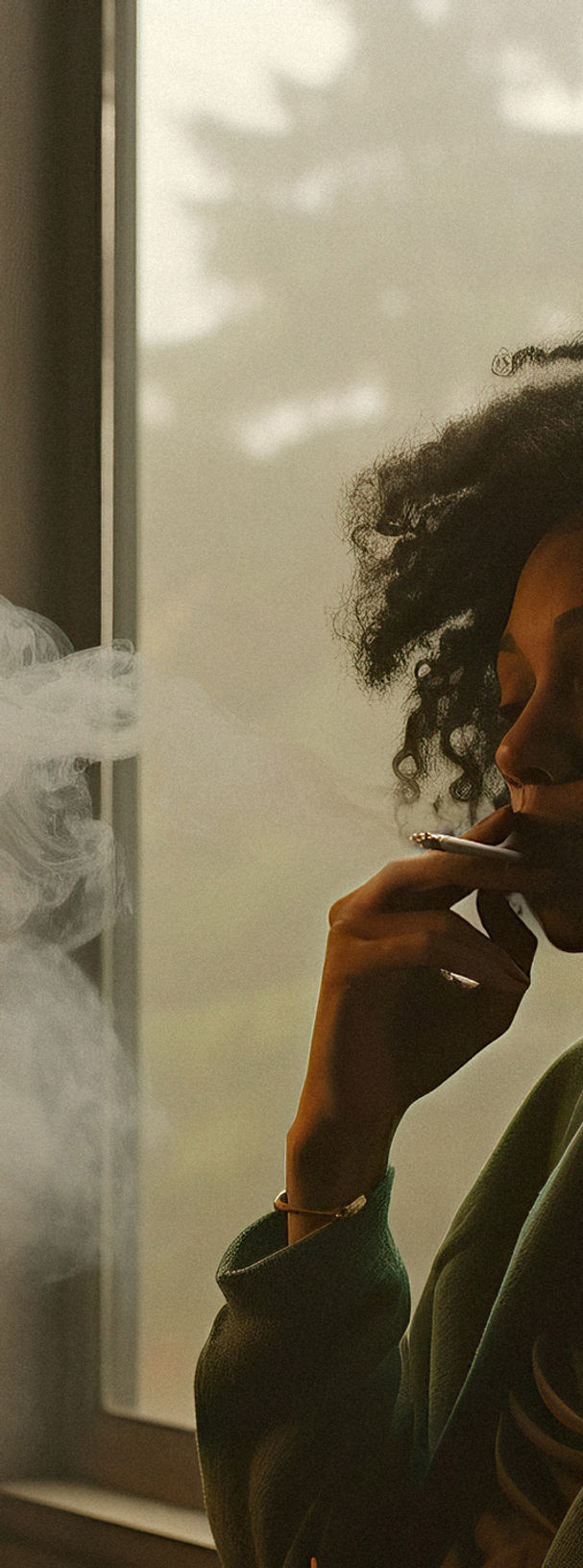 Smoking by a Window