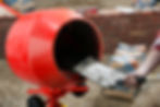 Cement materials being placed into mixer