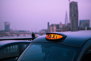 Close-Up Of Taxi sign