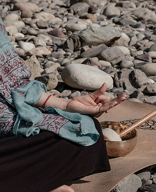 Meditation on rocky shore