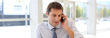 Man Making Phone Call in Office