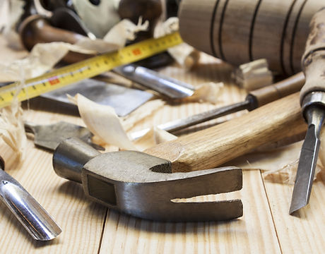 carpenter tools in pine wood table