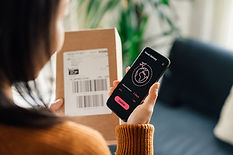 Woman confirming her delivery on smartphone