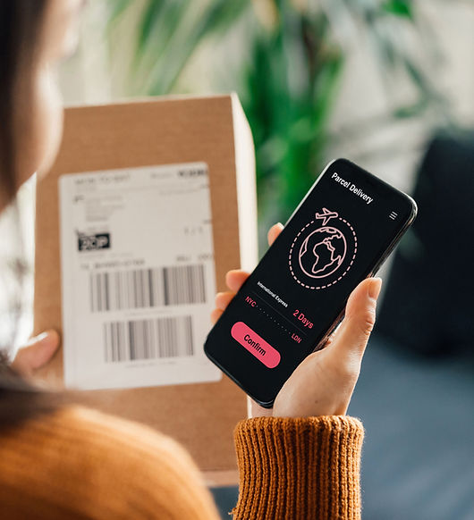 Woman confirming her delivery on smartphone