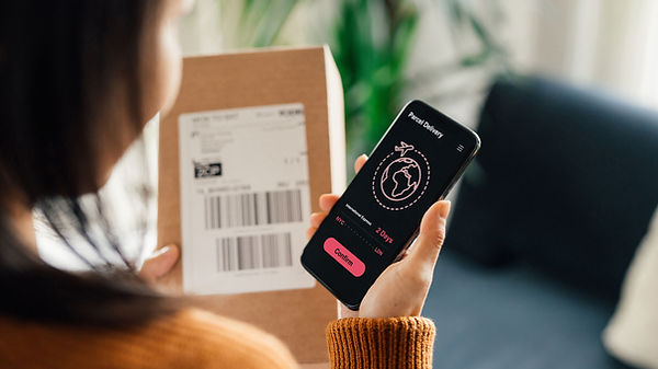 Woman confirming her delivery on smartphone