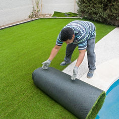 Laying artificial grass outdoors