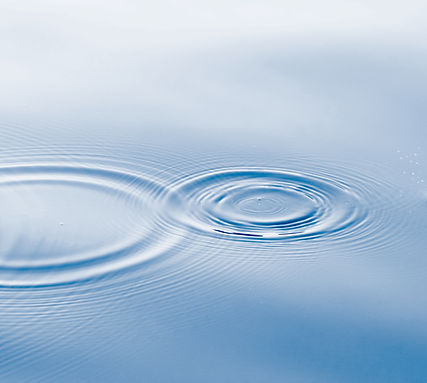 Calm water ripples representing reduced stress and a clearer mind