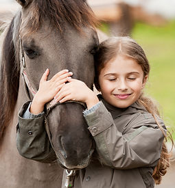 Girl Hugging Horse
