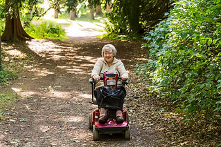 Woman on her mobility scooter