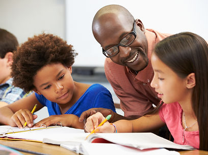 Teacher Helping Students