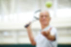 Senior Man Playing Tennis