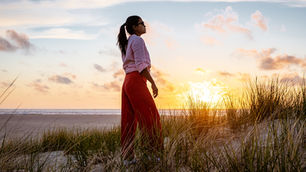A woman under the sunset