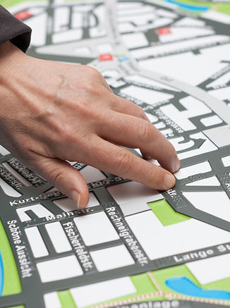 Hand on Map