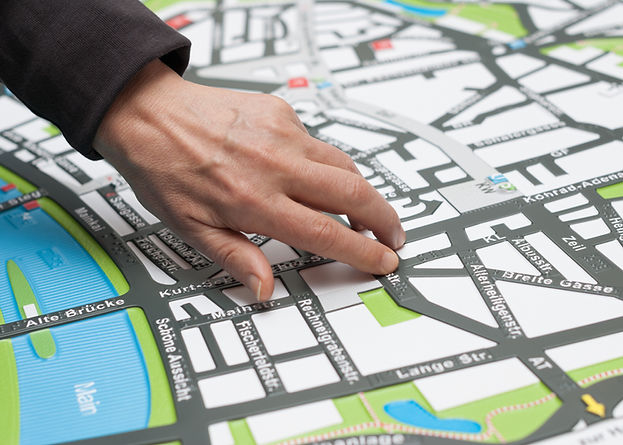 Hand on Map