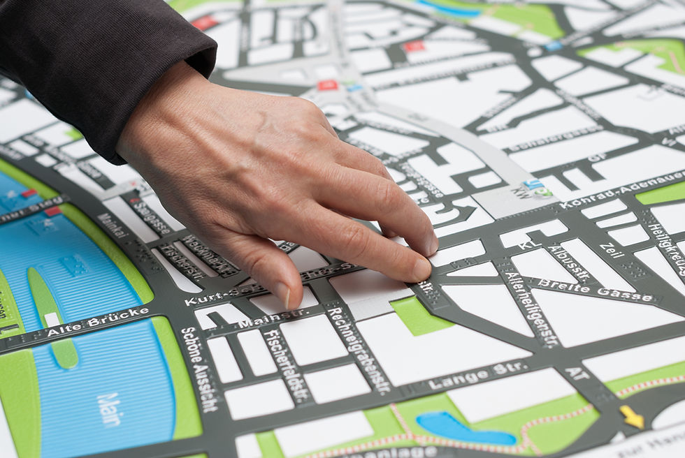 Hand on Map
