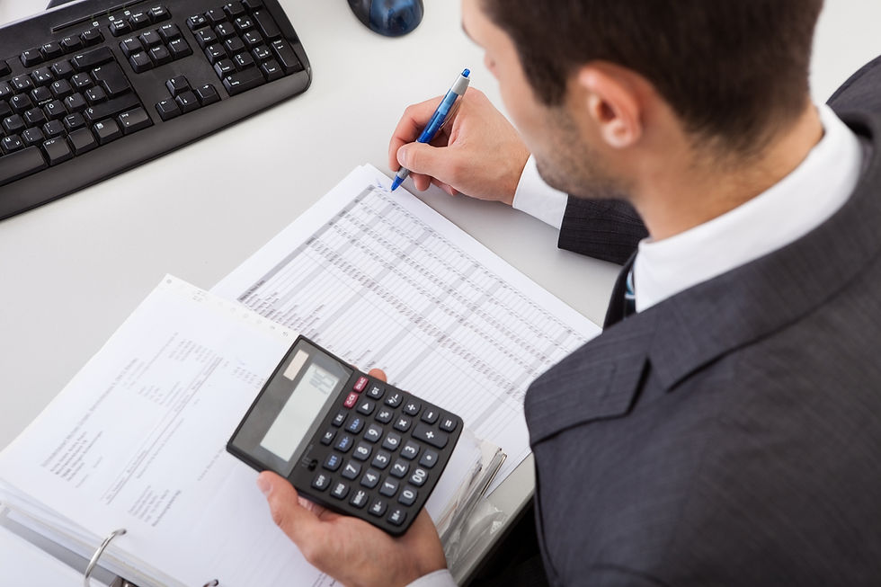 Top view of an accountant working on financial data in the office