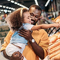 Family Buying Bread