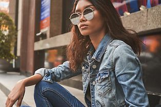 A woman in denim jacket