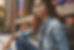 A woman in denim jacket