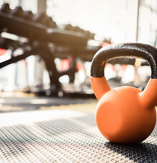 Orange Kettlebell in Gym