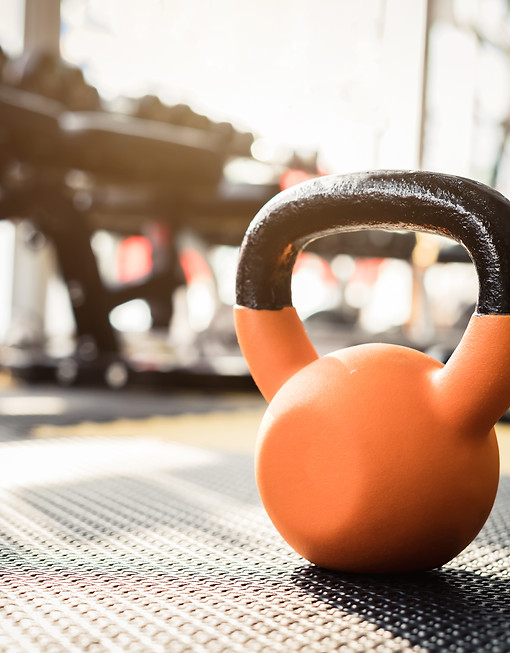 Orange Kettlebell in Gym