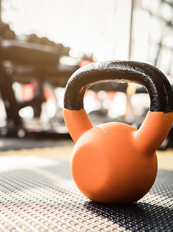 Orange Kettlebell in Gym