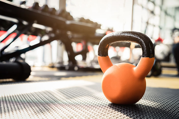 Orange Kettlebell in Gym