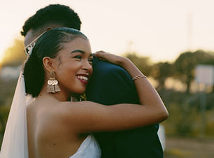 Bride and groom embrace